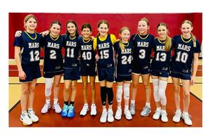 a picture of nine young girls in basketball uniforms