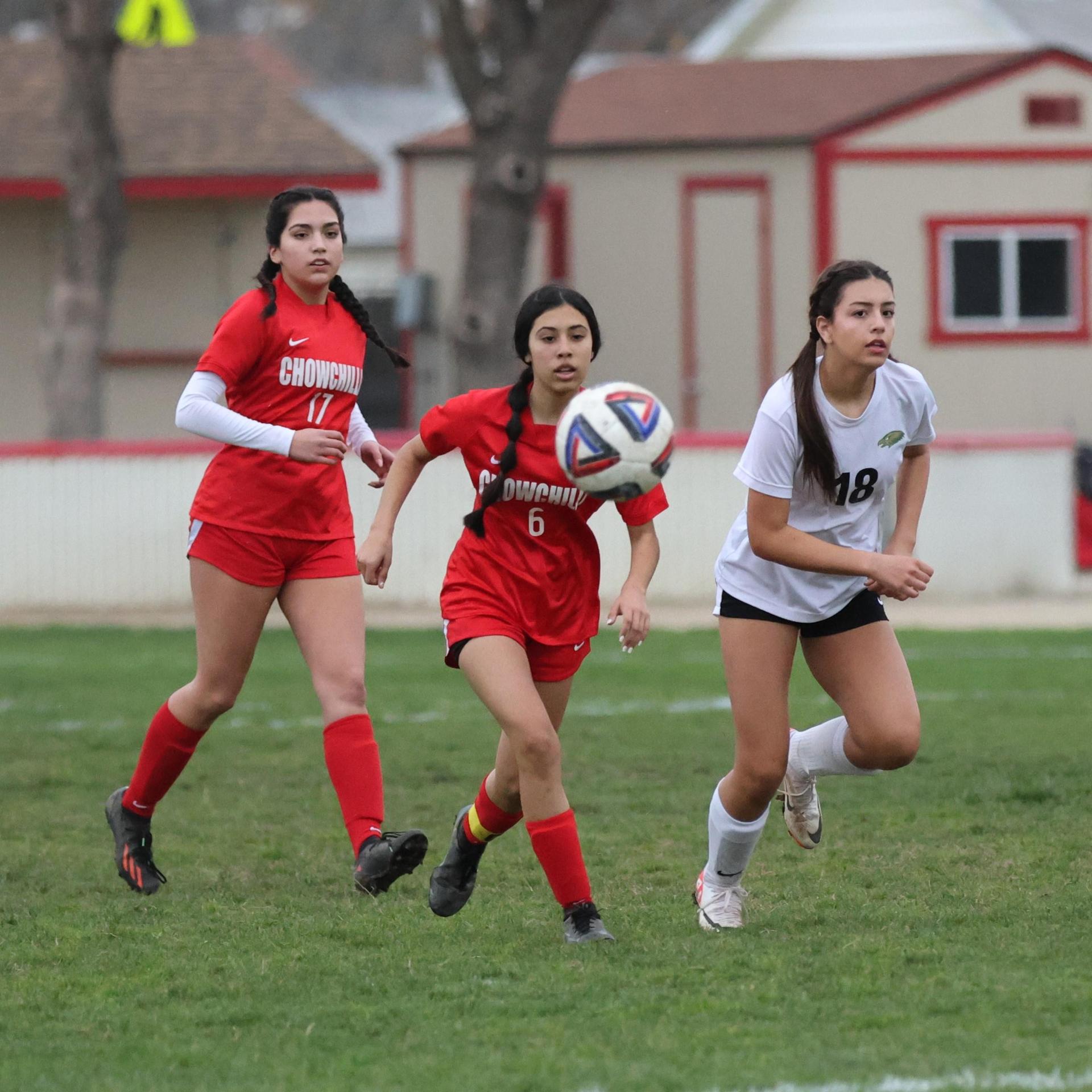 Junior Varisty girls playing soccer against liberty