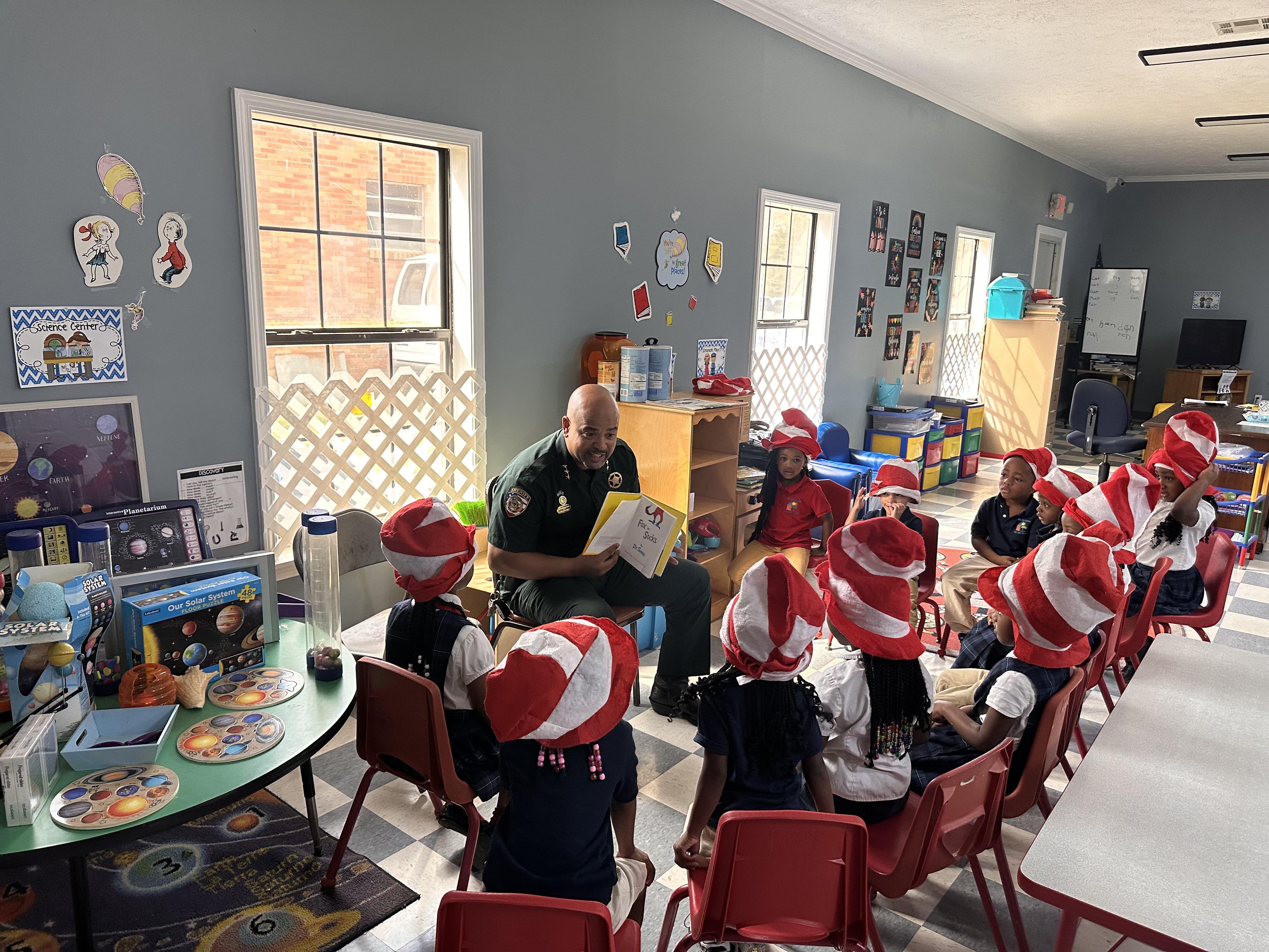 Pike County Sheriff’s Office Chief Deputy Damian Gatlin recently showed his support for local students by participating in Read Across America at Wee Care Academy Day Care Center in McComb