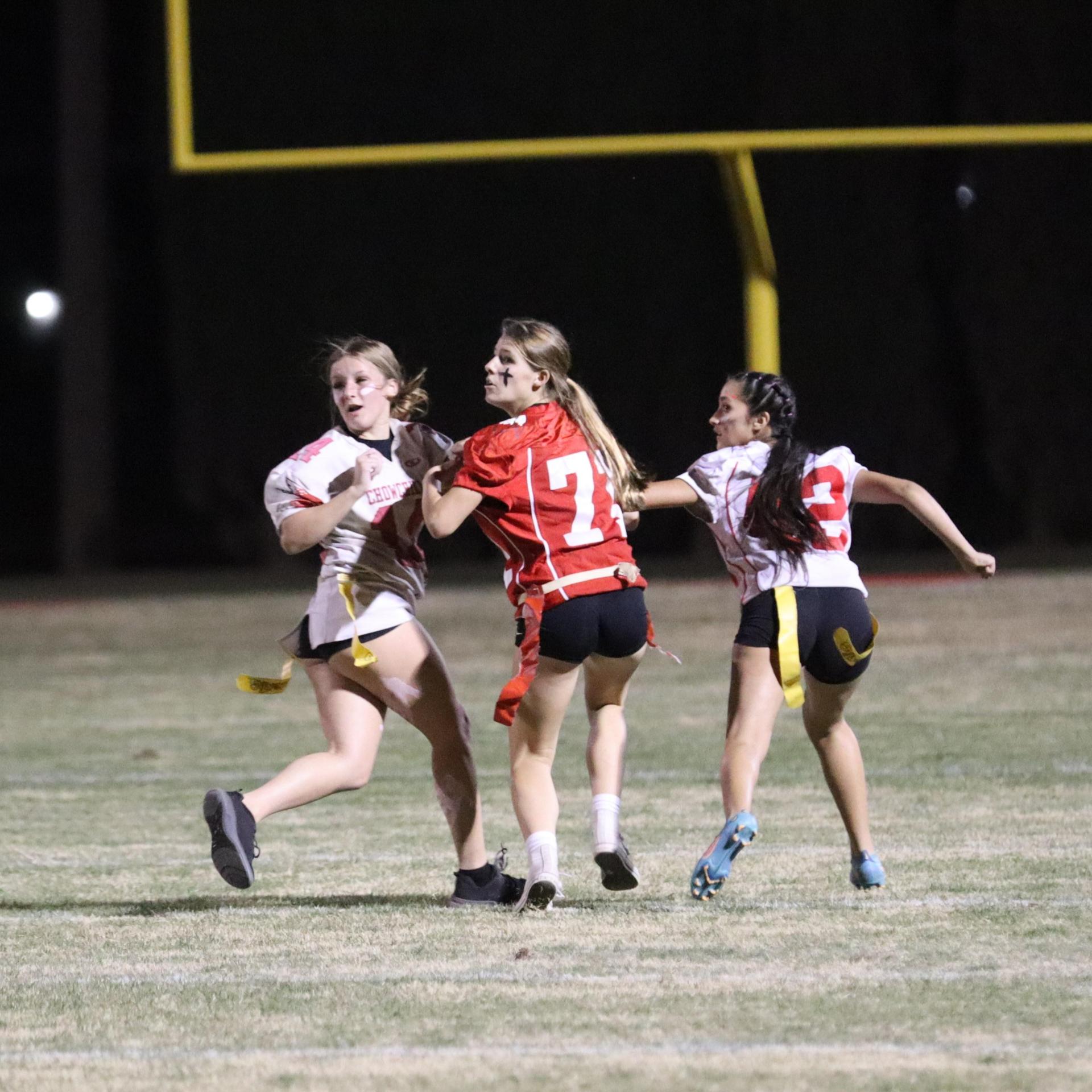 girls playing flag football