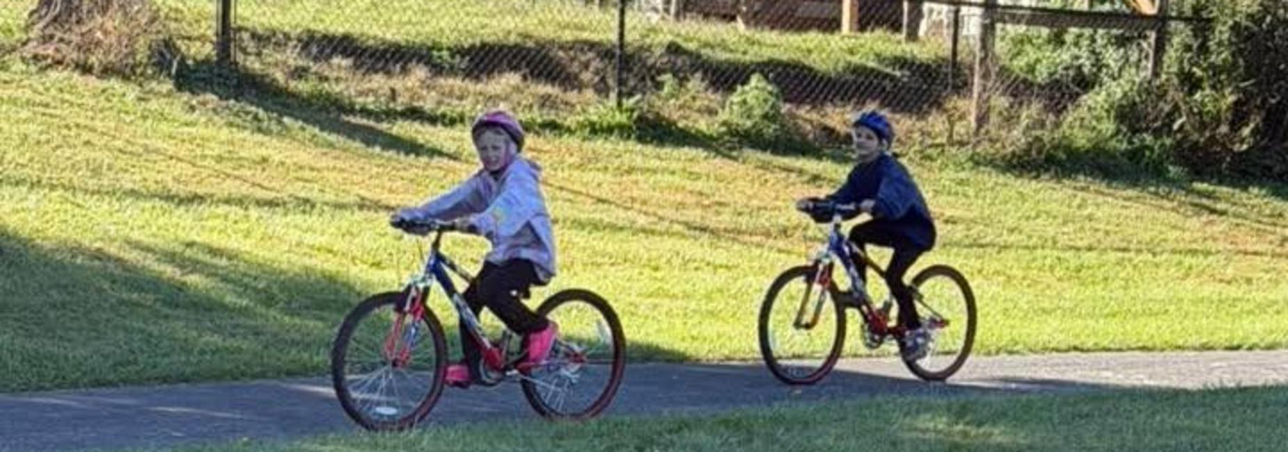 4th and 5th grade students riding bikes during Bike Unit