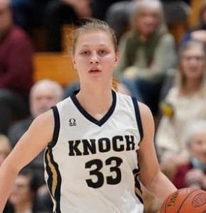 girl basketball player wearing number 33