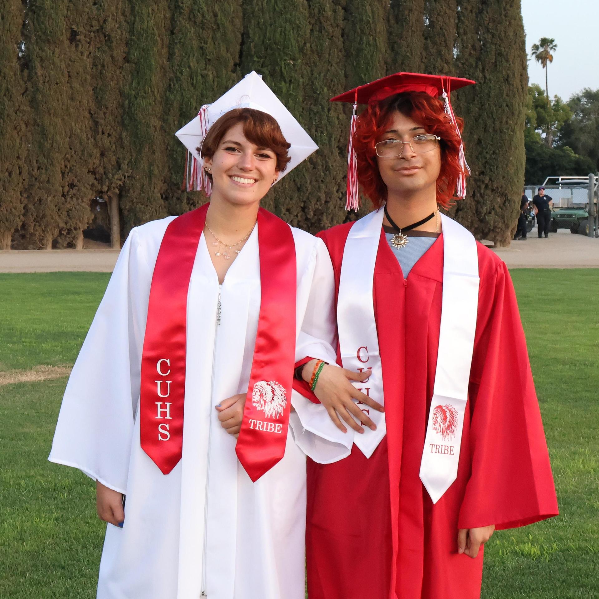 seniors posing together before walking in to graduation