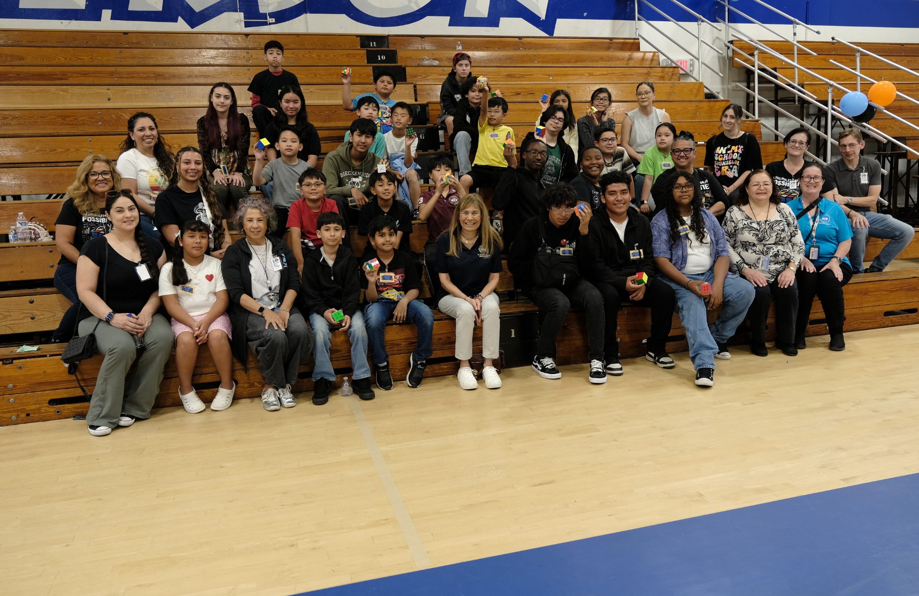Speed Cube day- all students sitting on bleachers at Speed Cube Day