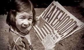 Girl holding newspaper saying :Statehood