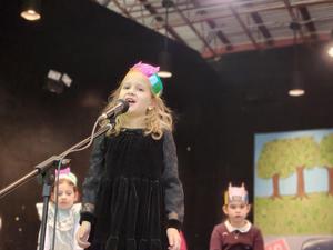 A student reciting a hebrew poem.