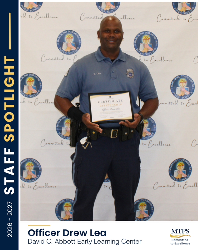 Officer Drew Lea stands in uniform holding his Certificate of Citizenship in front of a Marlboro Township Public Schools backdrop. The Staff Spotlight graphic identifies him with the David C. Abbott Early Learning Center.