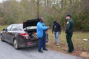 A Pike County Sheriff’s Office deputy stopped to assist Pike County citizens who were changing a flat tire