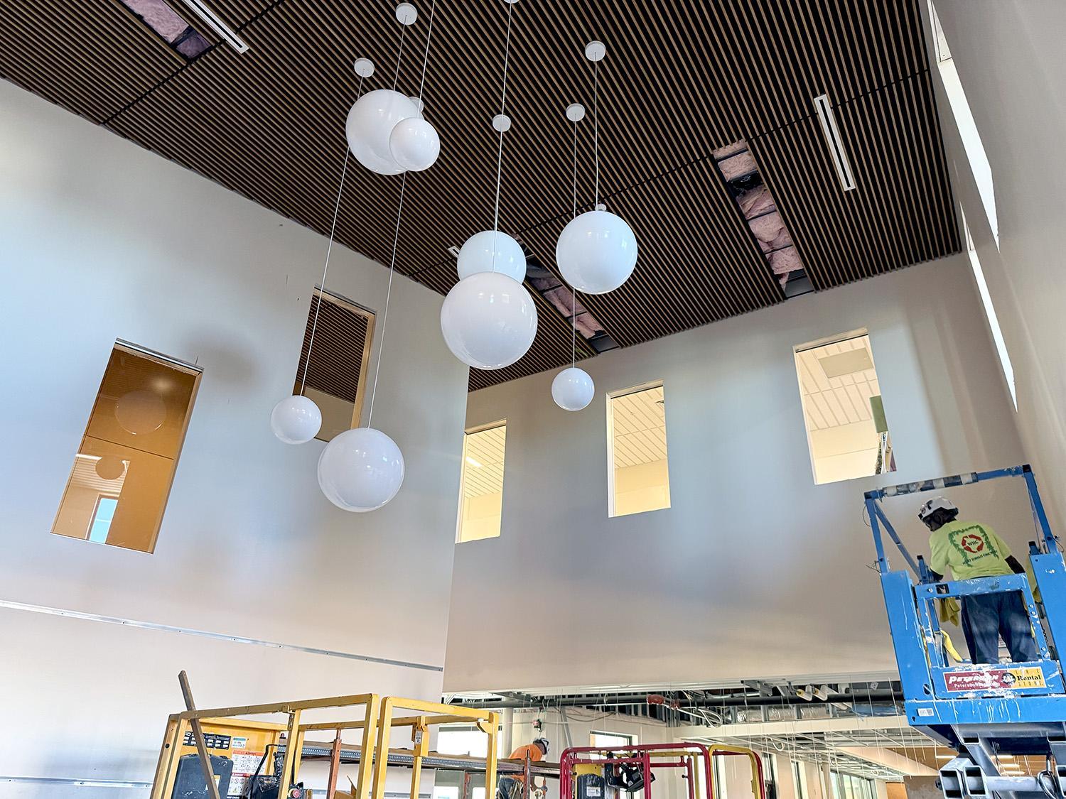 view of lobby ceiling grid and globular lighting