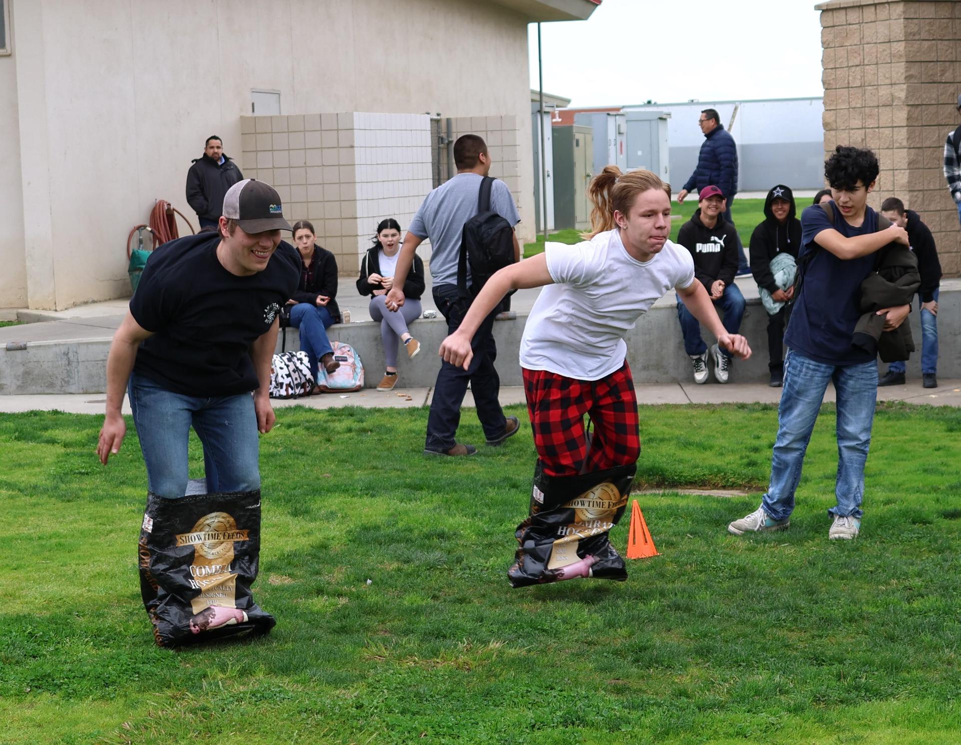students and staff enjoying the feed bag relay