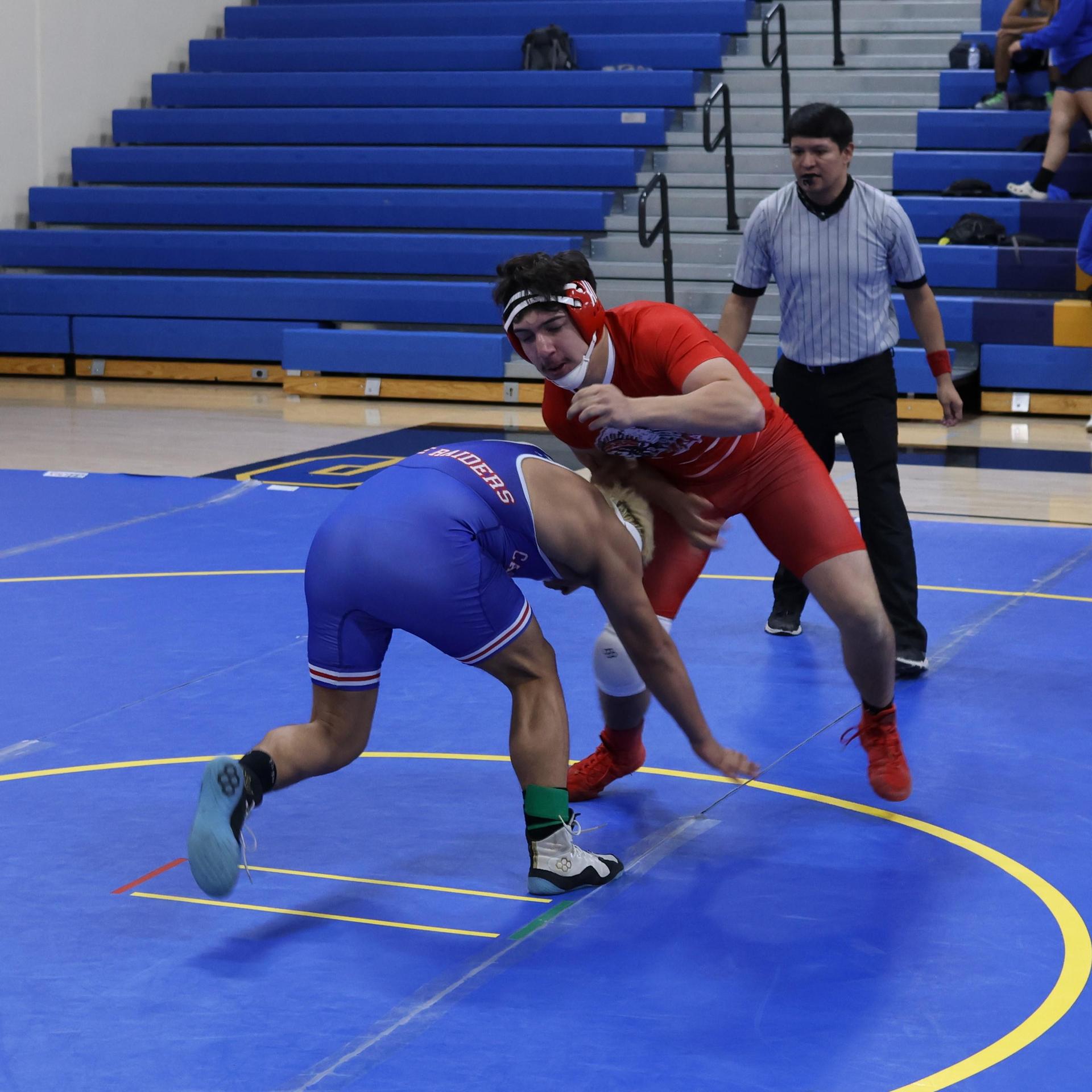 wrestlers in action at parlier