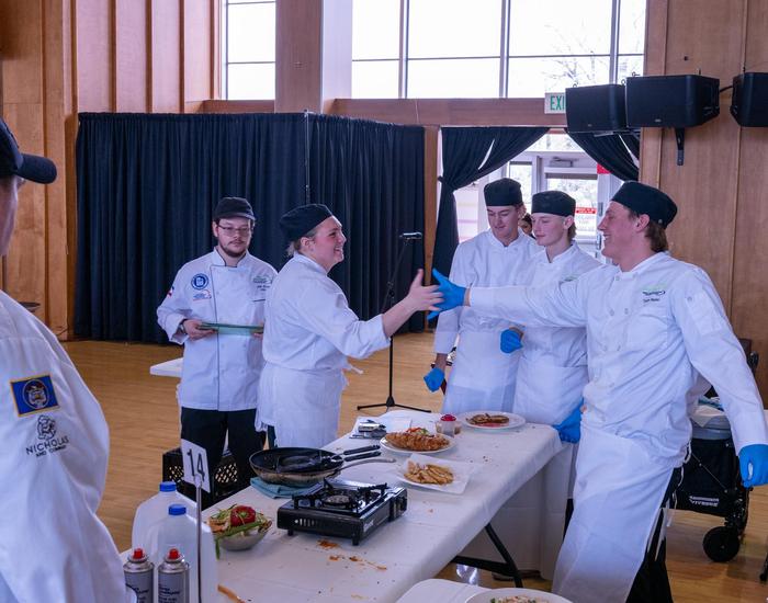 Students participating in cooking competition