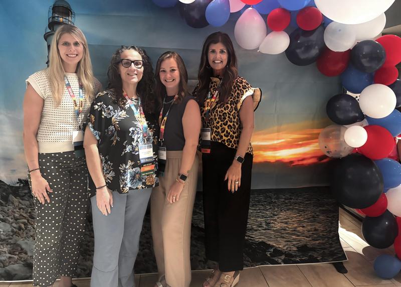 Counselors from MHS and MMS at conference.