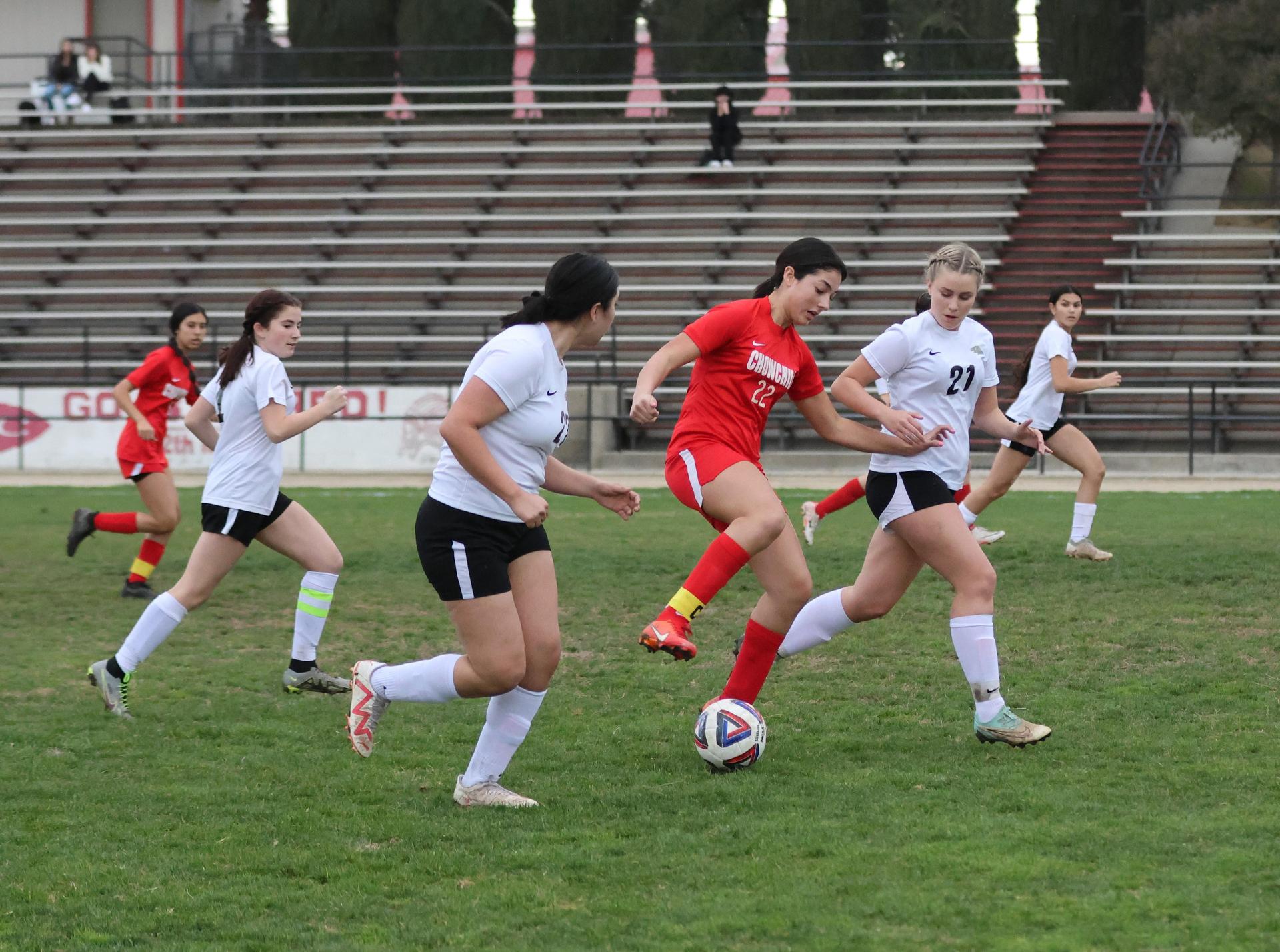 Junior Varisty girls playing soccer against liberty