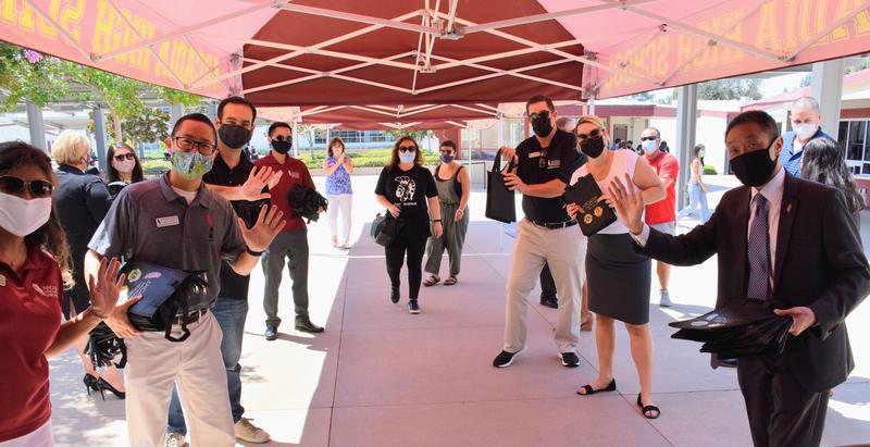 AUSD board members and admin waving hello