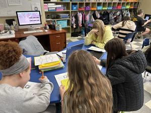 older student helping others