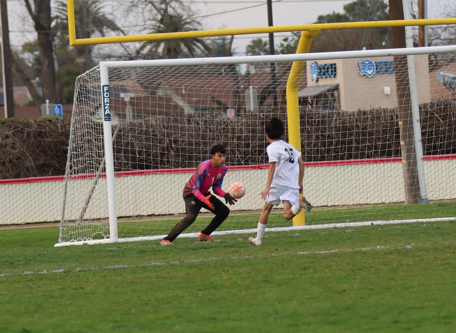junior varsity boys playing soccer against washington union