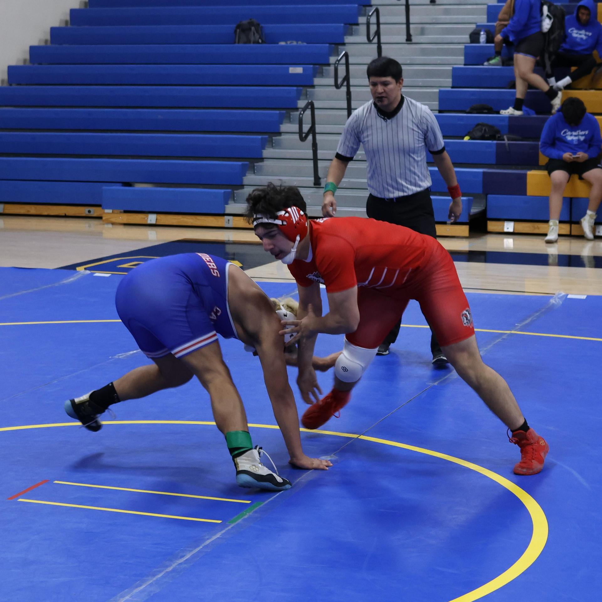 wrestlers in action at parlier