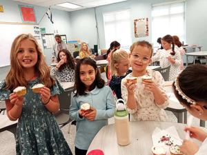 Showing off our cupcakes at the mesibas rashi