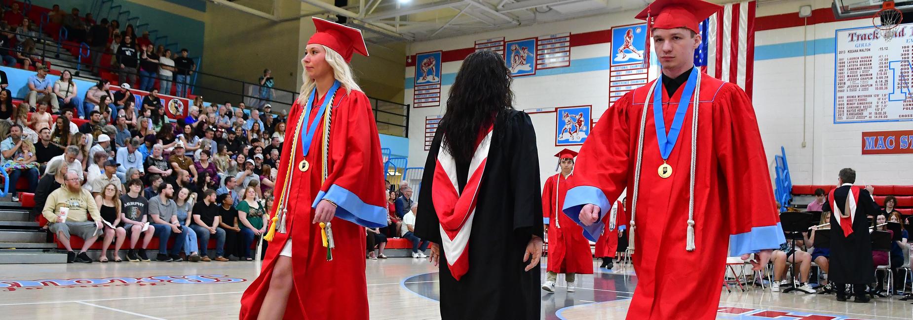 Graduates walking.