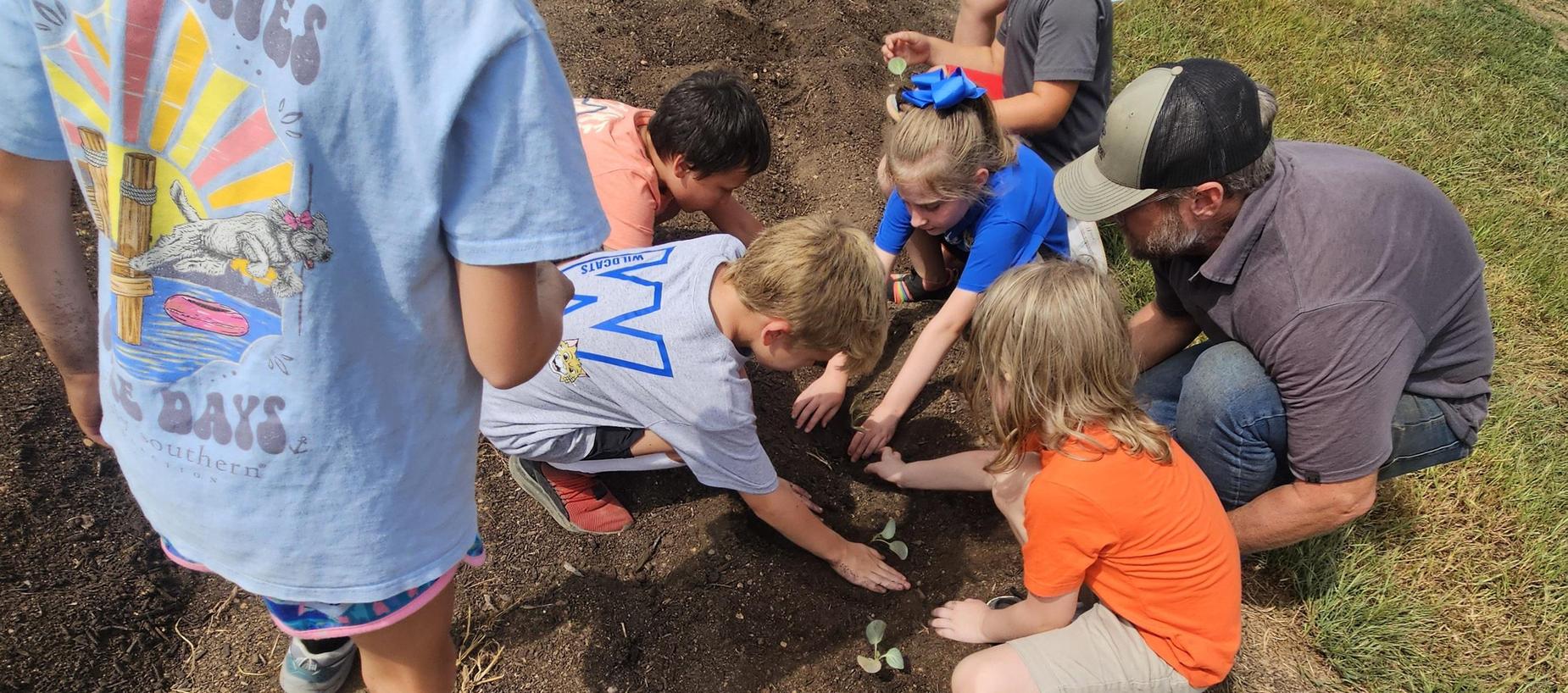 3rd grade planting at Ag day