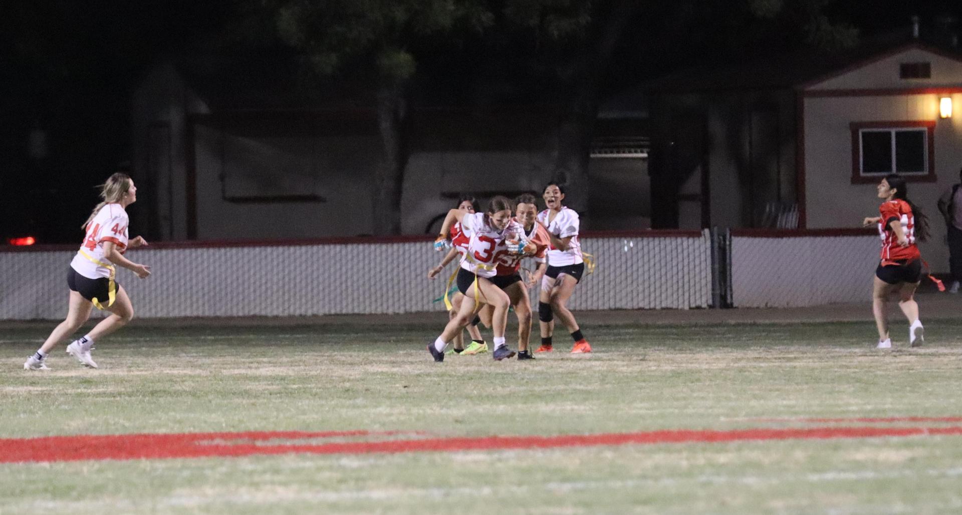 girls playing flag football