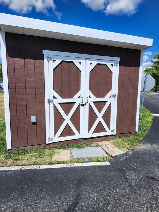A shed built by the Building Construction students that is for sale.