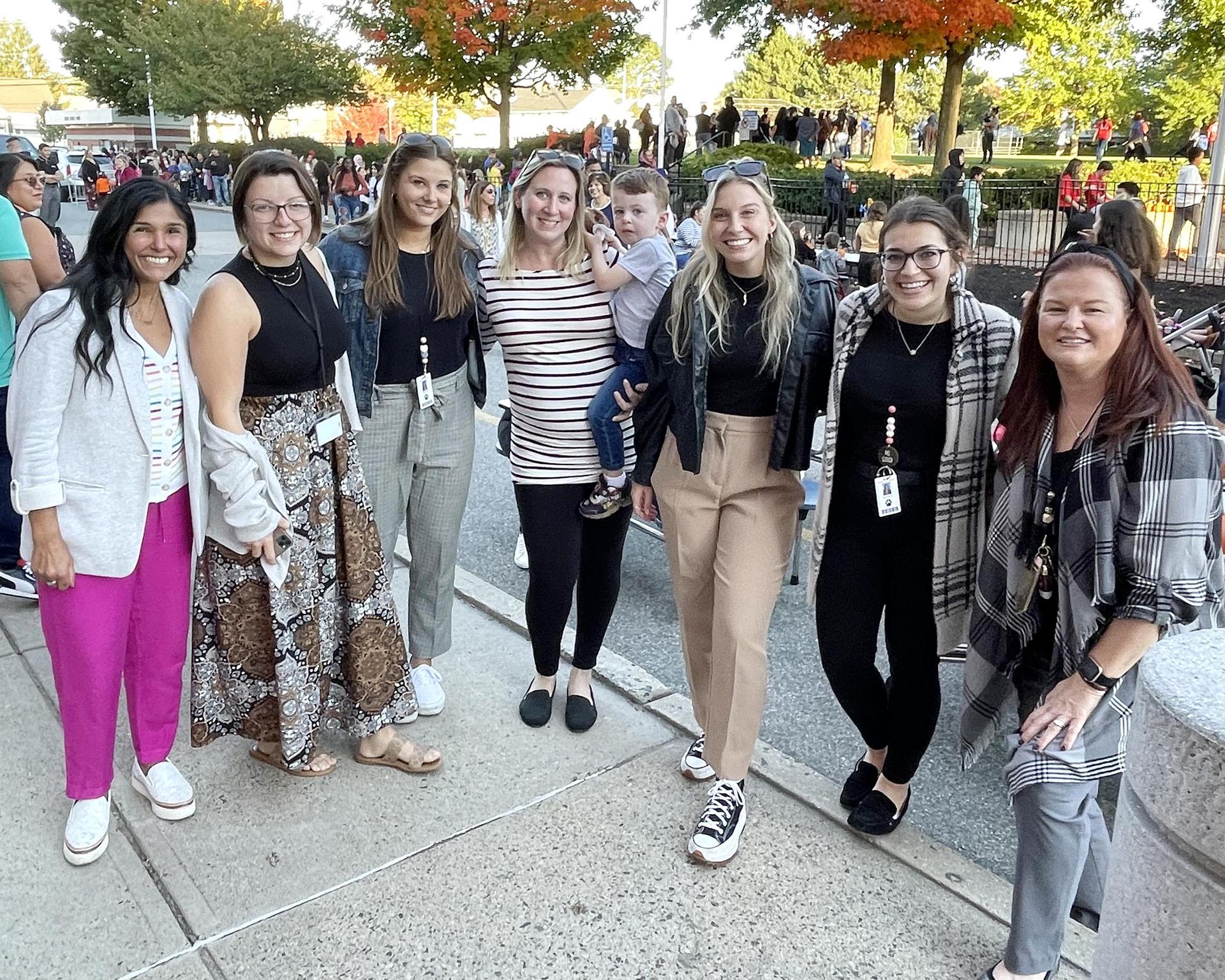 Group of educators, standing, outside