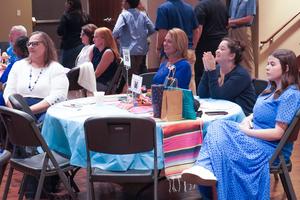 New teachers from Scott Elementary watch introductions