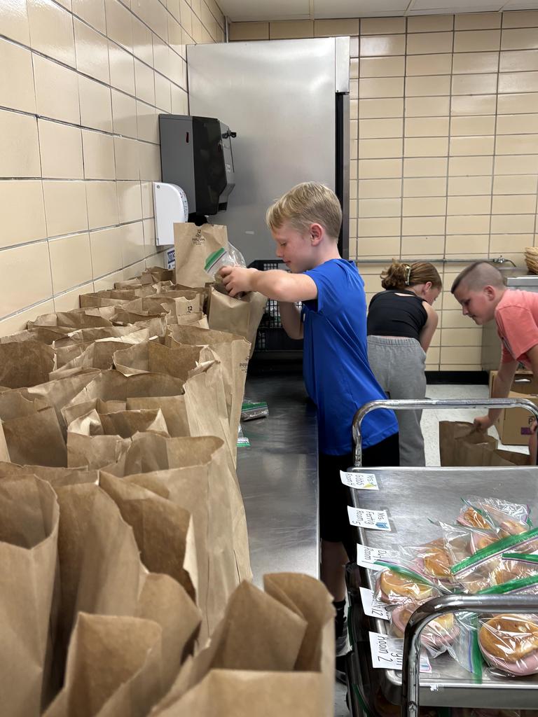 JV football team making Uncle Pete's lunches