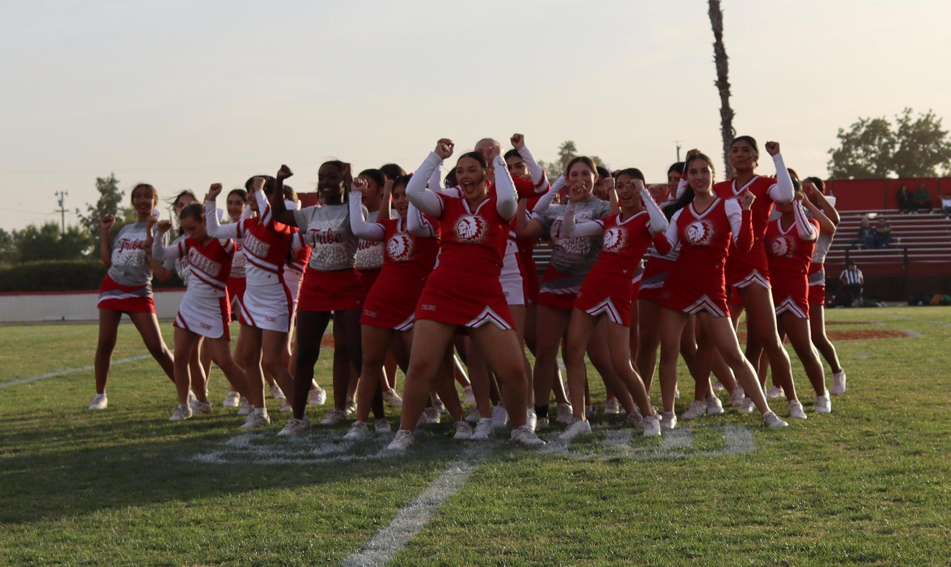 Cheerleaders performing at the football game