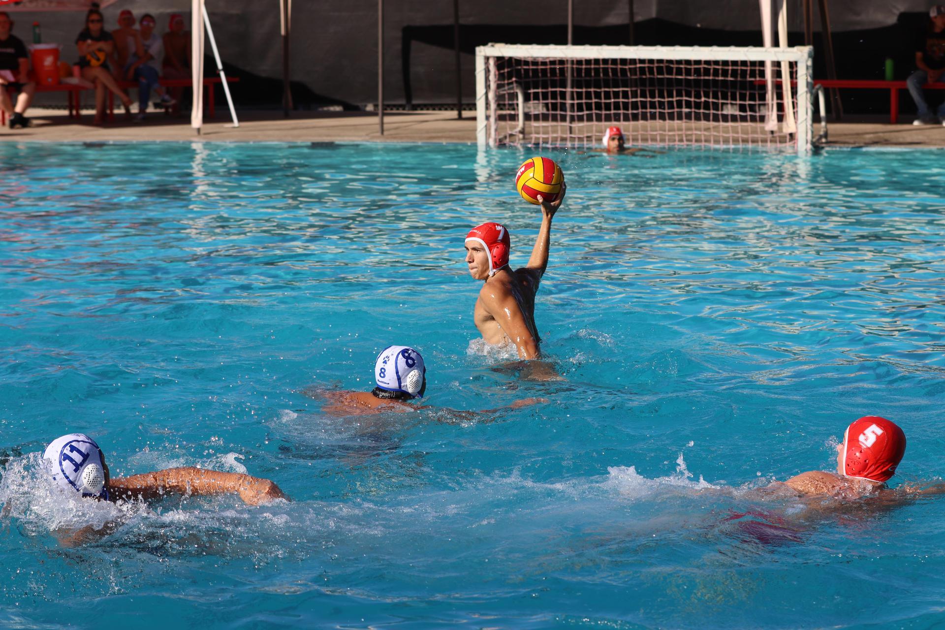 boys playing water polo against Madera