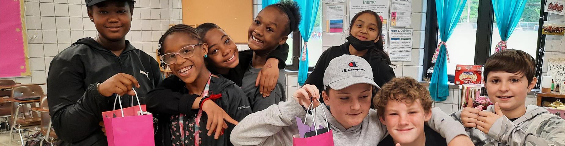 A few 5th grade student with goodie bags for our cafeteria staff!