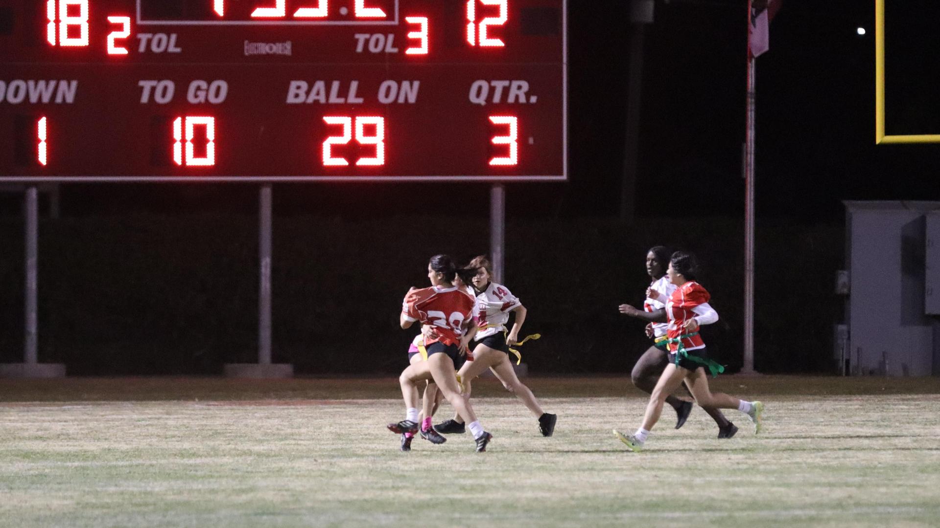 girls playing flag football