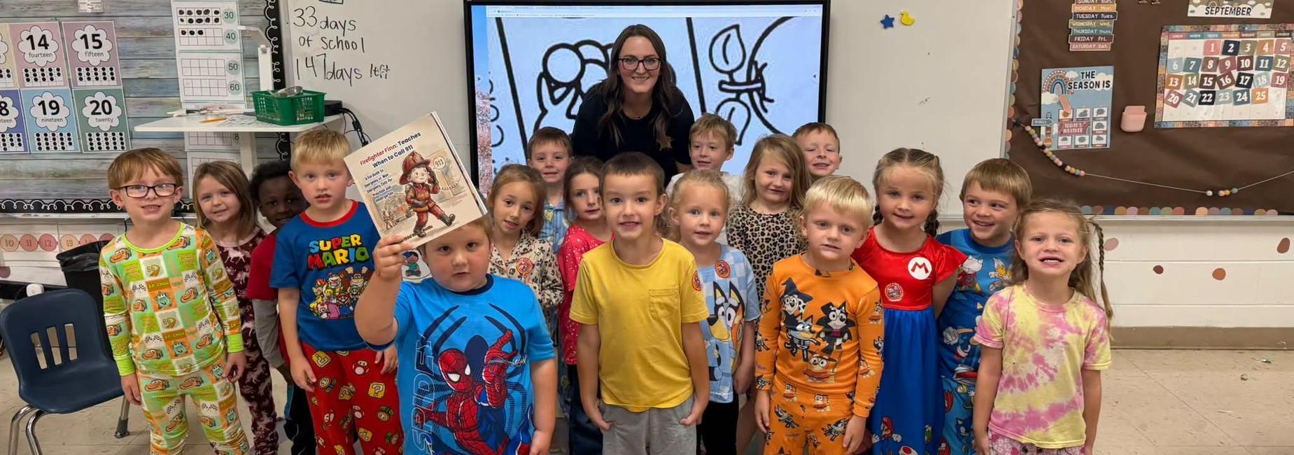 Deputy 911 Director Lakin Hess read to students at CES as part of the Community Connections program.