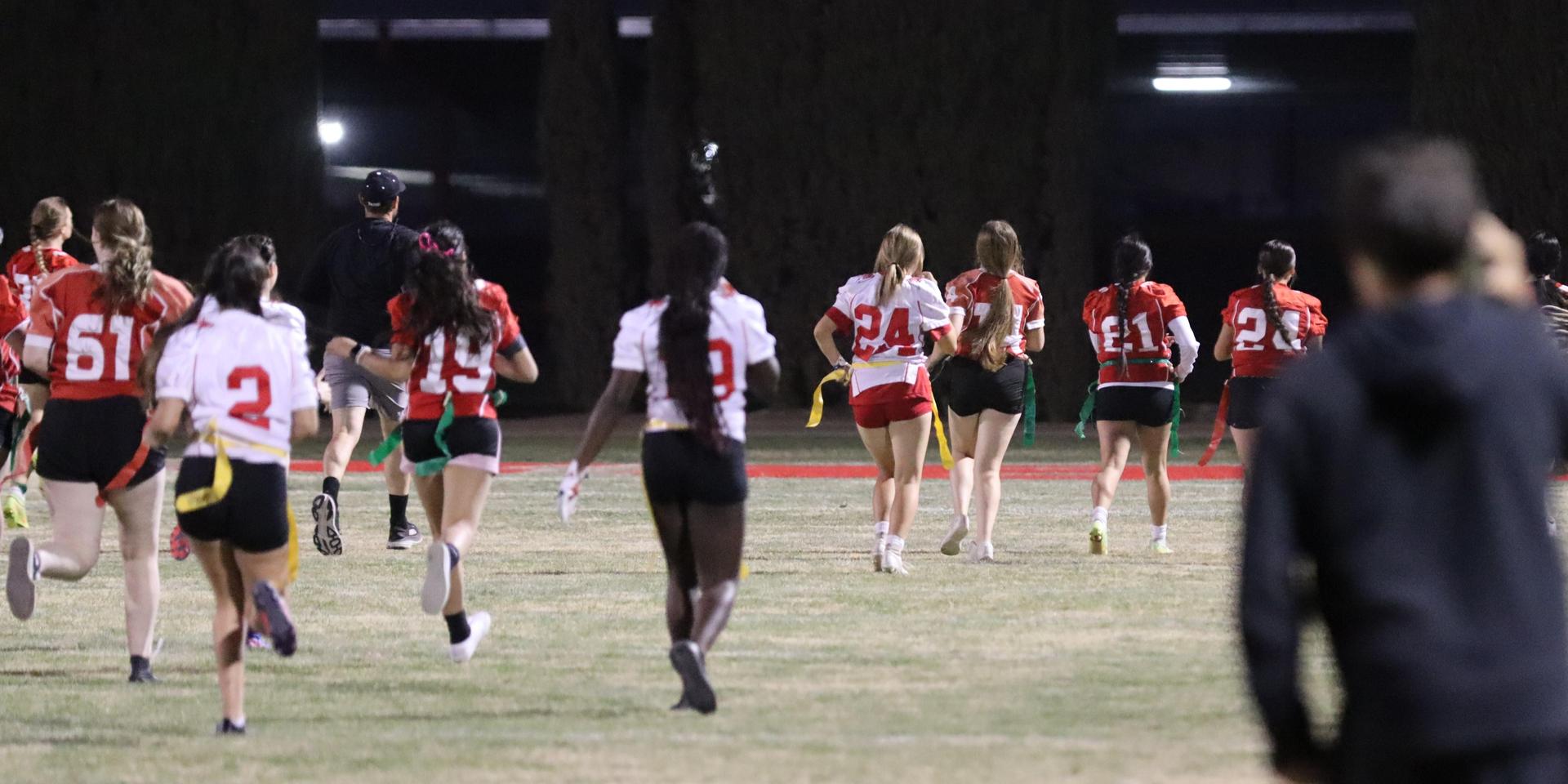 girls playing flag football