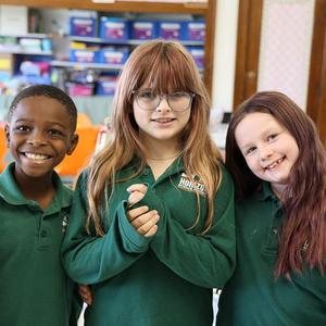 HSA students smiling in a classroom