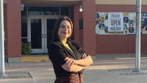 Brenda Zamora pictured standing in front of Mission CISD central office building