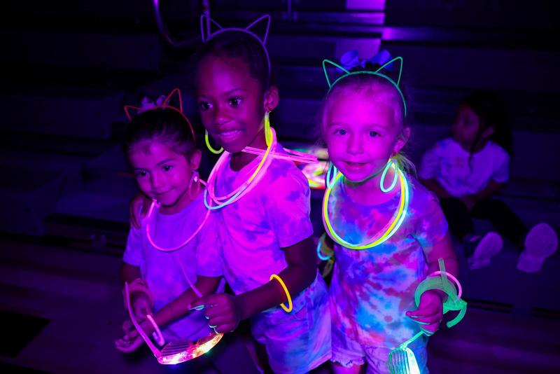Students at a glow in the dark fun run.