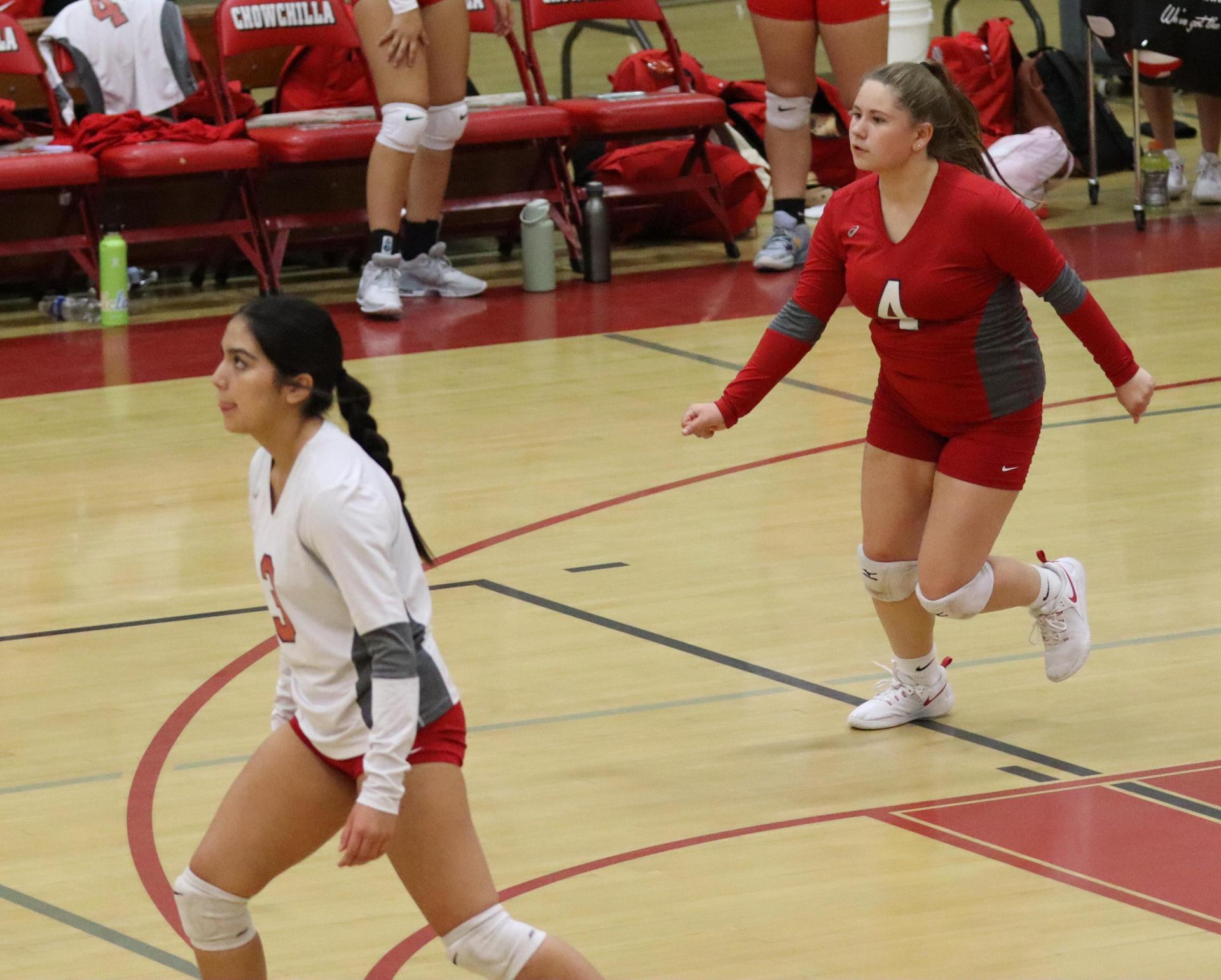 junior varsity girls playing volleyball against Liberty