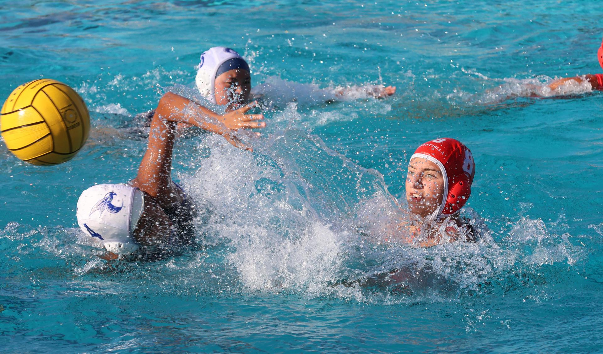 girls playing water polo against Sanger West