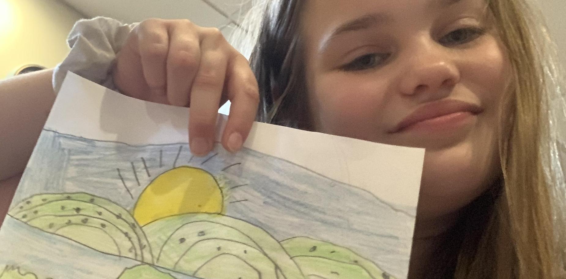 Cyber student with her artwork