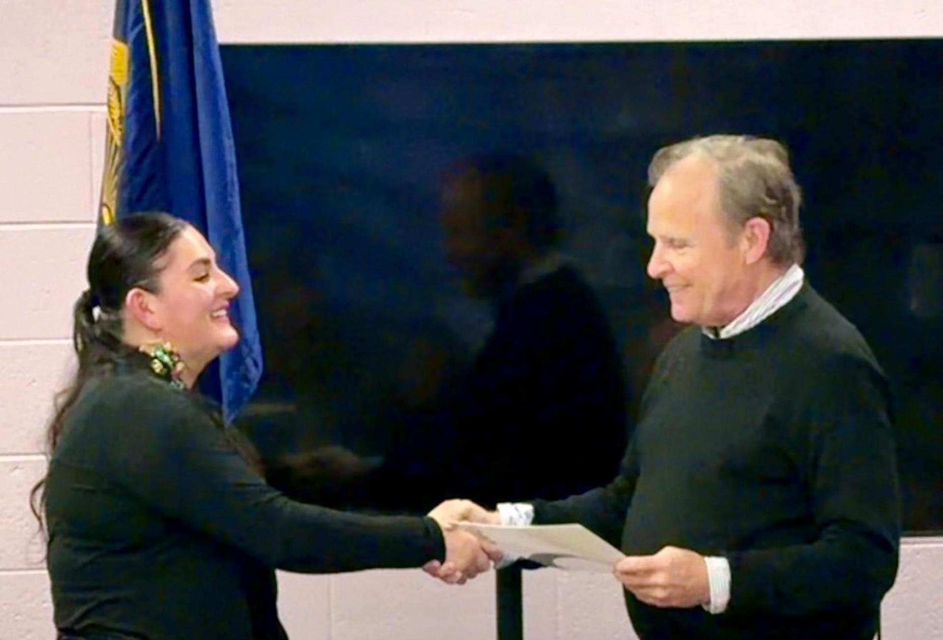 December award recipient with superintendent