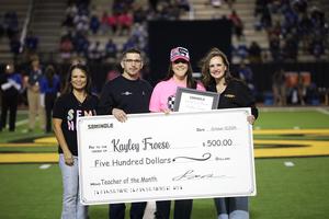Dr. Suarez, Dr. Hawkins, and Mrs. Garcia recognizes Mrs. Froese as Teacher of the Month