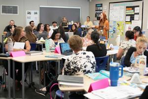 Board room filled with new teachers