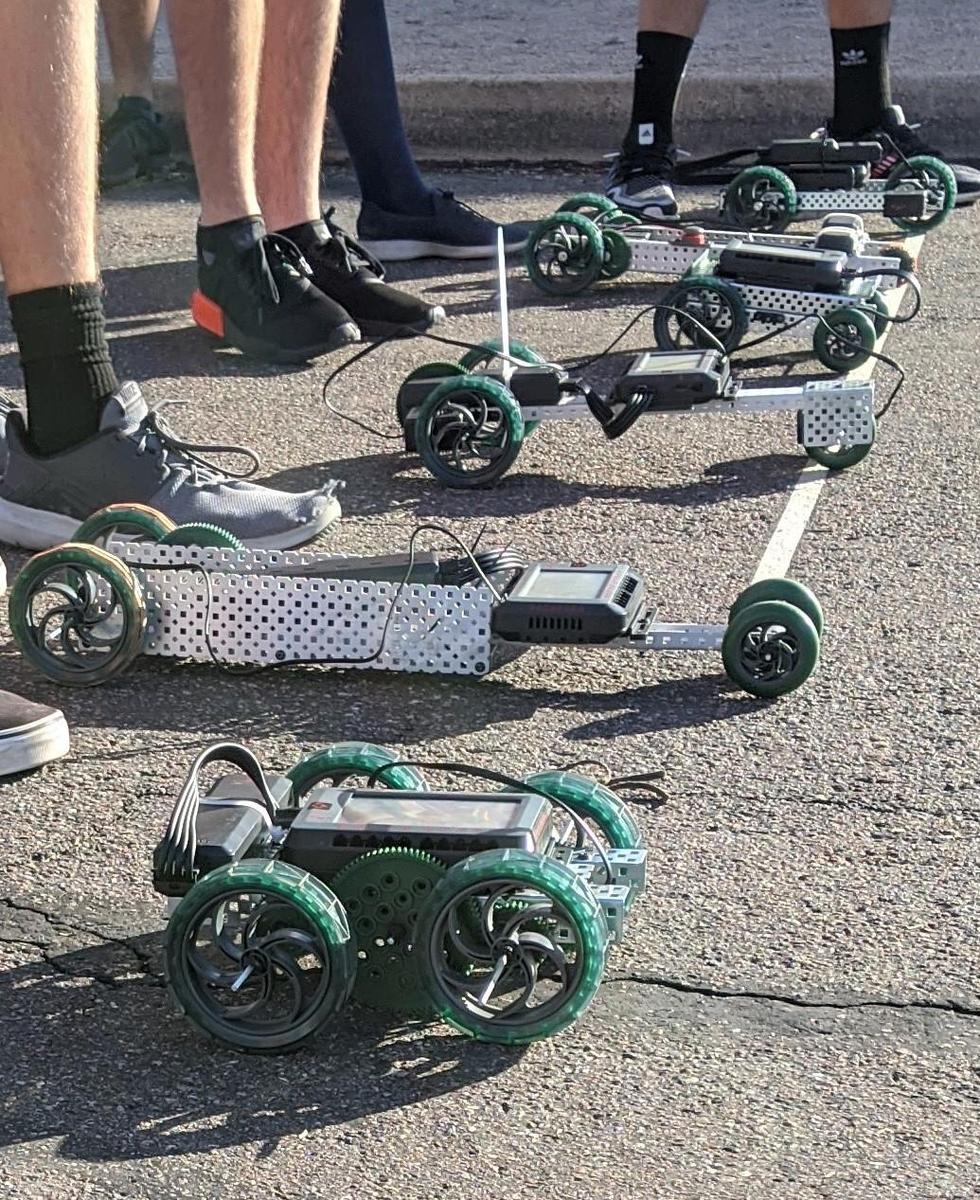 Vehicles lined up in parking lot
