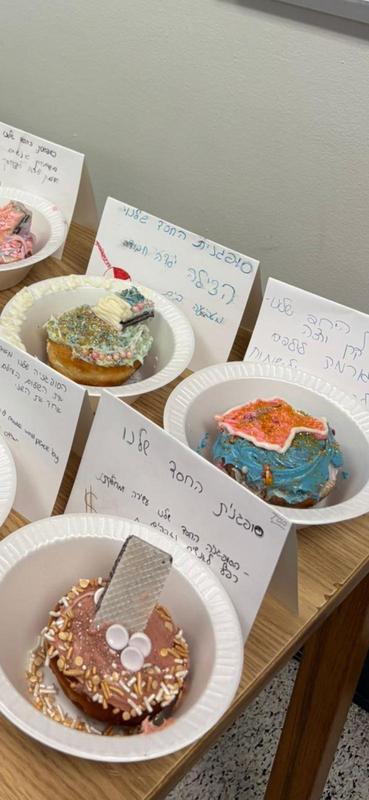 sufganiot with their hebrew descriptions.