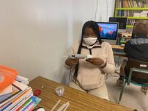 Students working on Christmas door decorations