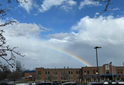 Rainbow in sky over Norwin High School