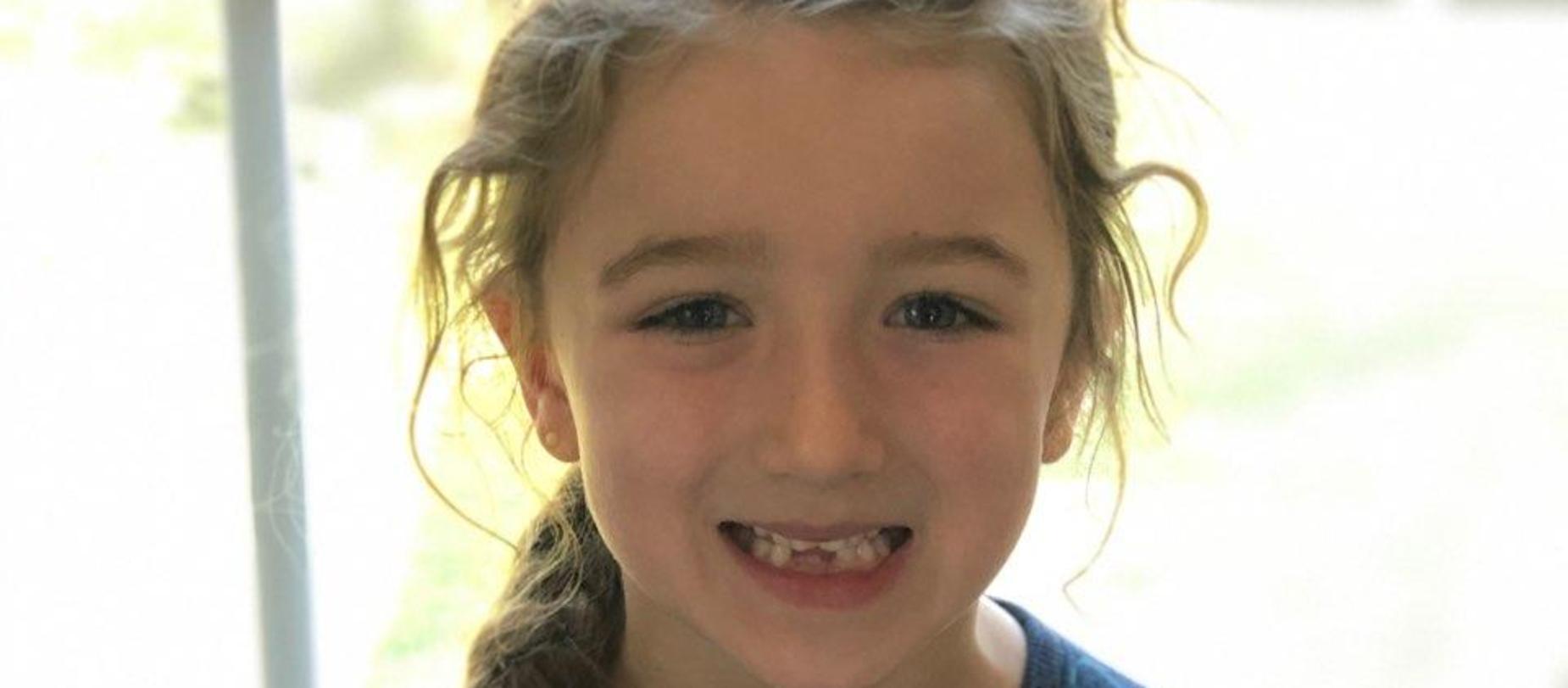 girl smiling for the camera